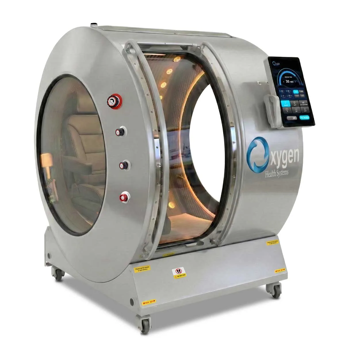 Vital Sphere 360 brushed silver stainless steel hard-shell hyperbaric oxygen chamber on caster wheels with a large oval viewing window, illuminated cream interior, and external touchscreen control panel
